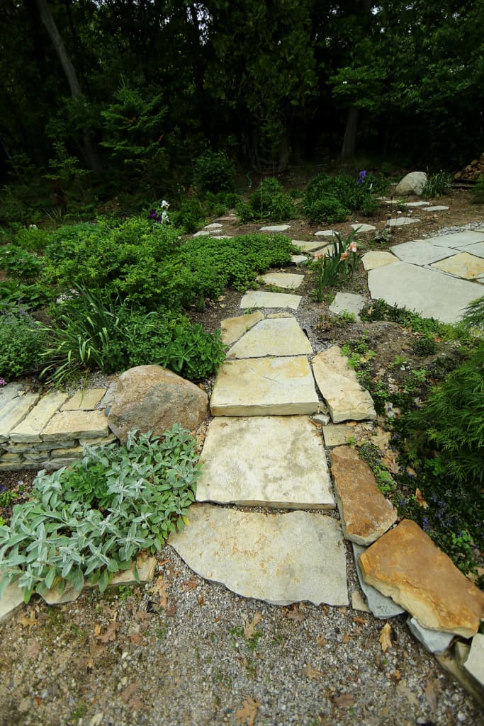 Flagstone landing on the entry walk.