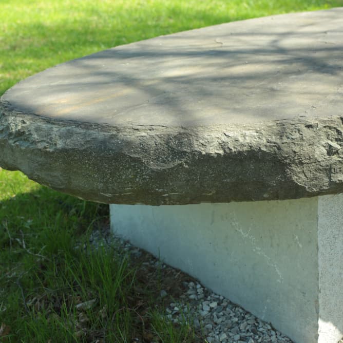 Stone bench in winter.